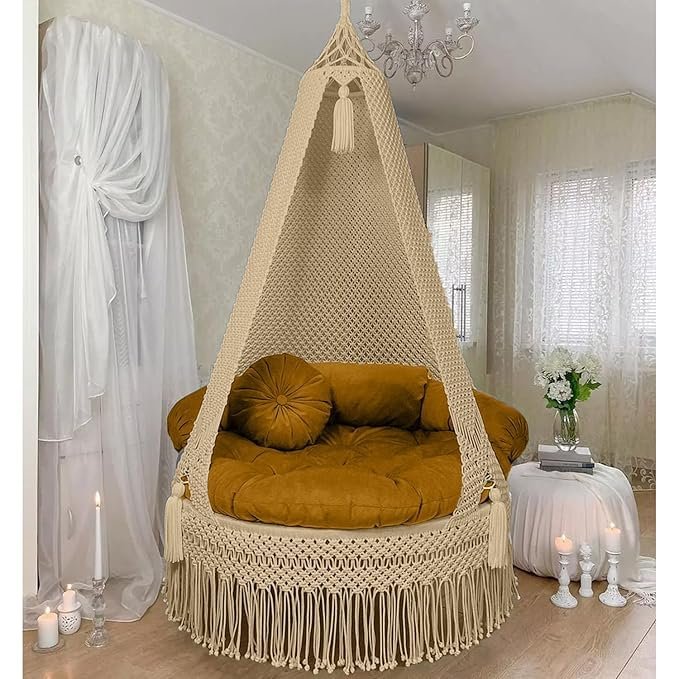Macrame hanging swing chair with comfortable cushion for indoor decor.